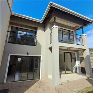 Modern 4-Bedroom Duplex with Scenic Greenbelt Views in Secure Estate