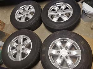 17inch Ford Ranger/Everest original mags with used 265/65/17 tyres