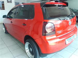 2010 POLO VIVO 1.6 MANUAL RED COLOR  PETROL 96,000KM 