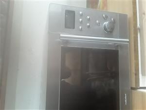 30 litre 900W output, stainless steel Morphy Richards microwave oven