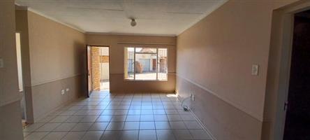 Not to be missed – spacious townhouse with lock up garage