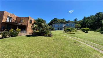 Rare Coastal Investment – Three Homes on One Spectacular Stand with Ocean Views