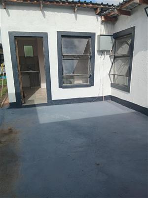  1 bedroom with ensuite bathroom with kitchenette, parking