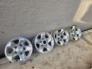Set of Toyota Land Cruiser 16 inch Original Mag wheel s in good solid condition