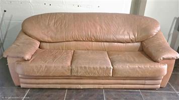 Genuine leather couch needs some TLC still in good condition