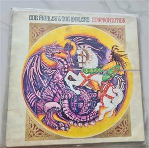 Bob Marley & The Wailers – Confrontation Vinyl LP There is age related wear to the cover