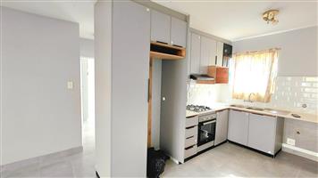 Newly refurbished 2 bedroomed Unit on 1st floor TO LET in Queenswood, Pretoria.
