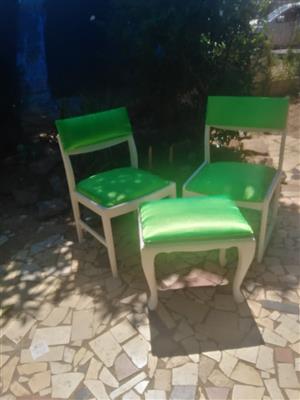3 white green satin chairs