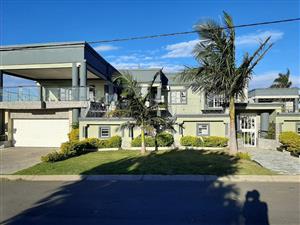 Large investment property offering multiple tenanted units with income!