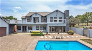 ELEGANT 6-BEDROOM HOME IN PRESTIGIOUS ESTATE