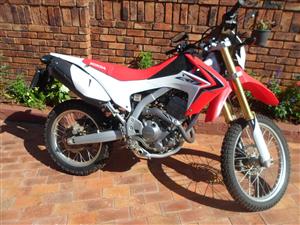 2013 Honda CRF 250 on road.