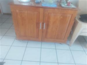 A wooden cupboard for sale double door