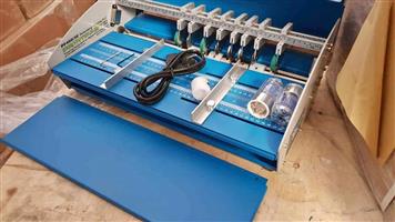 Perforating machine for invoice books New Electric