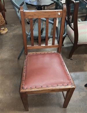 antique wood and leather chairs