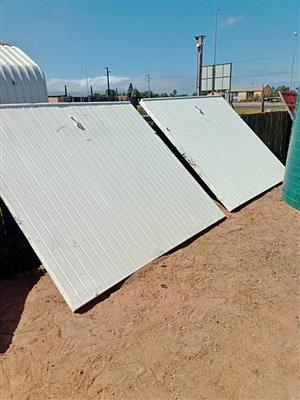 2× single wooden garage doors