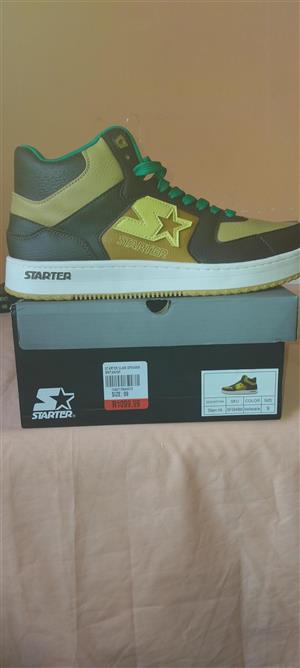 Brand new Starter sneakers size 9 in the box.
