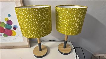 2 x lamps with wooden bases . Size 46 high  22 diameter. 