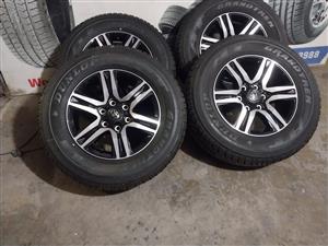 17inch Toyota Hilux/Fortuner original mags with brand new 265/65/17 Dunlop Grand