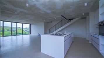 ELEVATED TOWNHOUSE WITH VIEWS OVER ZULULAMI AND THE SEA