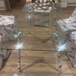 Glass dining table with black metal legs Size 180x90.Good condition. Collection in Seapoint