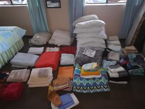 Various linen and pillows for sale 