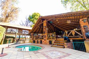 Expansive Farm with Enchanting Dwellings in Walkerville's Exclusive Boomed-Off Area!