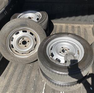 Full set of chev utility steelies (some tire wear and includes a spare wheel)