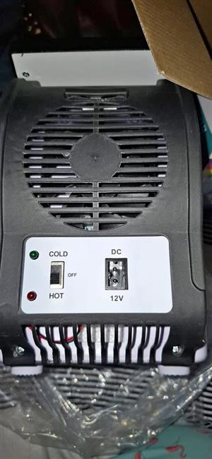 Portable Electronic Cooling and Warming Refrigerators