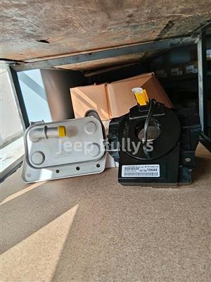 Brand New Jeep Cherokee KJ Oil Cooler & Clock Springs