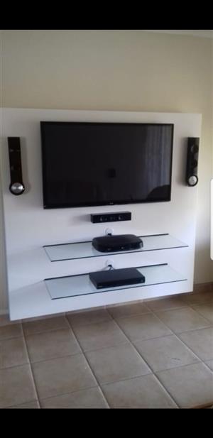 White floating TV to be mounted on the wall...selling for 3000