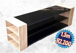 New TV stand with glass shelves and storage