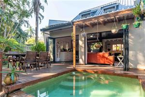 Exquisite designer  home with two income generating flats