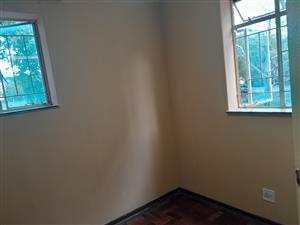 Room with windows in a ckean 2 and half bedeoom apartment