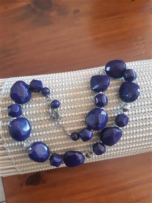 Here is an assortment of necklaces. Purchase together .