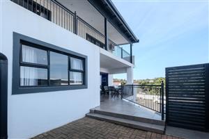 Stylish sea-view duplex with income potential
