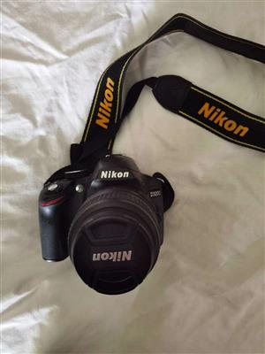 Nikon D3200 with Nikon DX 18-55mm lens and Vanguard bag