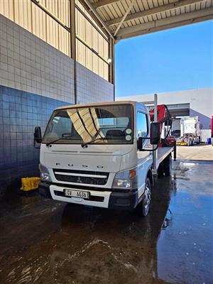 Mitsubishi Fuso FE7-136 with crane