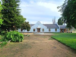 This exceptional 34-hectare farm offers the perfect blend of modern country living.