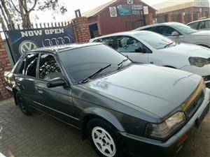Prime Auto Mazda 323