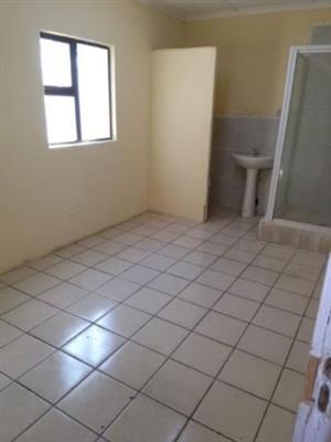 Germiston Central open plan bachelor flat to rent on Oosthuizen Street for R2750  bathroom and kitchen 