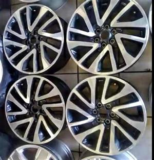 18inch new Nissan Navara original mags set .