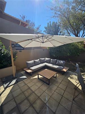 Outside lounge set with umbrella