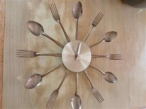 Clock stainless cutlery detail (needs a clean)