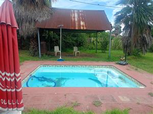 Charming 3-Bedroom Family Home with Pool & Ample Parking