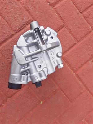 NISSAN NAVARA AIRCON PUMP. GENUINE. BRAND NEW. FOR VARIOUS OTHER CARS TOO.