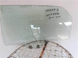 Mazda 2 right rear door glass original