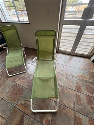 Foldable green relax/deck chairs