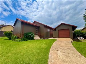 Spacious 3-Bedroom Home with 2-Bedroom Flat and Great Potential in Tasbet Park