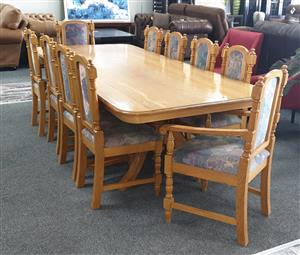 Solid Oak 10 seater table and chairs
