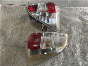 2010 DAIHATSU TERIOS TAIL LIGHTS FOR SALE. IN PRISTINE CONDITION